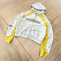 Sudadera con capucha de felpa francesa 100% algodón con logo personalizado, efecto desgastado vintage, estilo streetwear, estampado serigrafiado, con cremallera, oversize y corte cropped.