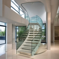 Escalier en spirale moderne en acier galvanisé pour intérieur avec rampe en verre et barreaux, écologique, taille personnalisée pour salon