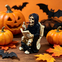 Vente directe usine : Figurine en résine amusante de squelette Grim Reaper assis sur les toilettes en lisant un journal – Statue de squelette