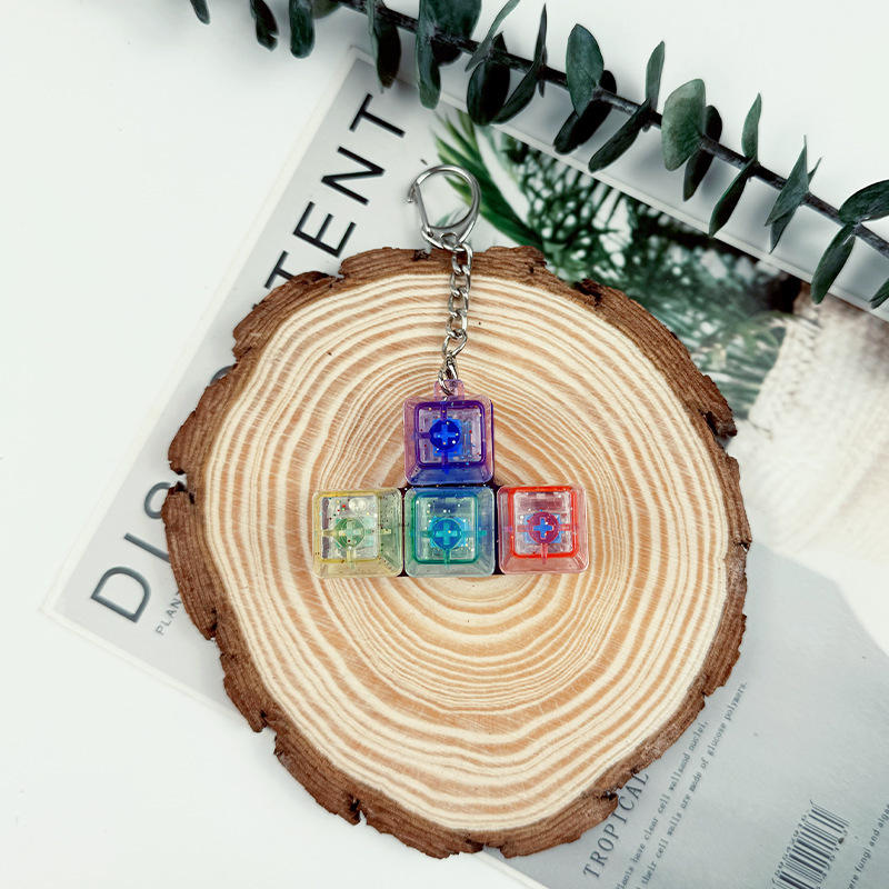 Tapa transparente de cuatro teclas con forma de T mixta