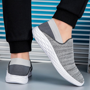 Sneakers décontractées unisexes sportives et confortables, dessus en toile, semelle extérieure en PVC, semelle plate légère, design à enfiler, résistantes aux taches - Product Image 4