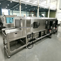 Machine de lavage automatique de cages à poulets SUS304 à haute pression et eau chaude 80°C pour l'industrie de la transformation de la volaille