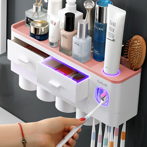 luxury home bathroom plastic accessory set automatic toothpaste squeezer tooth paste dispenser holder with Toothbrush Holder