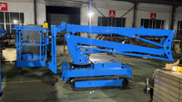 Ascenseur à chenilles hydraulique avec bras de flèche pliable pour le travail sur le toit, l'entrepôt, l'industrie et les installations extérieures