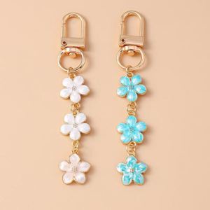 Porte-clés en métal simple et tendance avec perle et fleur de cerisier, pendentif mignon en forme de cœur, décoration pour téléphone portable et sac à dos - Product Image 3