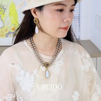 Ensemble collier et boucles d'oreilles perles, style luxe léger, sensation haut de gamme, chaîne de clavicule, bijoux artistiques rétro, vente chaude