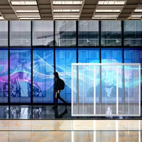 Écran vidéo LED transparent P3.9-7.8, mur vidéo LED transparent, écran de fenêtre en verre LED transparent avec installation suspendue pour utilisation multimédia