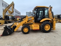 Chargeuse-pelleteuse JCB 3CX d'occasion, faible kilométrage, état impeccable, disponible immédiatement