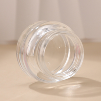 Pot en verre unique de 50g de pot de crème de gommage pour le visage couvercle galvanisé doré logo personnalisé pommade remplie de 50ml pots en verre pour le soin de la peau des yeux