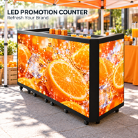 Comptoir promotionnel LED d'intérieur avec écran vidéo couleur et roues pour la dégustation de boissons et la promotion de marque