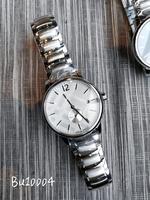 Nouvelle montre à quartz tendance pour couple, style simple et élégant, avec cadran de 40 mm, boîtier en alliage, fenêtre de cadran en verre, affichage par aiguilles