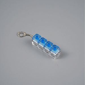 Botón de descompresión de plástico con luz, llavero luminoso portátil con cuatro teclas de eje mecánico, colgante de descompresión - Product Image 1