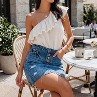Mini-jupe en jean vintage taille haute boutonnée pour femme - Jupes en jean bleu déchiré avec ourlet effiloché - Style bohème chic coupe trapèze