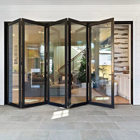 Venta al por mayor de fábrica: Puerta plegable doble panorámica de aleación de aluminio, ligera, impermeable, insonorizada y resistente al fuego, hecha a medida.