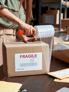 Extra thick 80 gauge stretch <b>wrap</b> with strong self-adhesion and tear resistance. Comes with convenient handle for easy use - Product Image 5