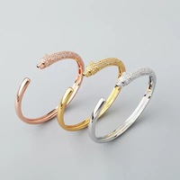 Nouveau produit, bracelet jonc ouvert en forme de tête de léopard en zircon cubique, design hip-hop, luxe léger, tendance, bijoux