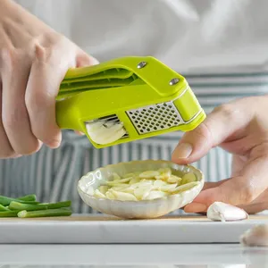 Multifunctional Plastic Garlic Press and Peeler 2 in 1 Manual Kitchen <b>Tool</b> with Wide Handle and Double Slot Chopper Mincer - Product Image 3