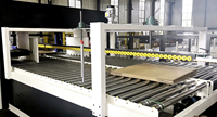 Machine à cerclage en ligne pour cartons en carton ondulé avec bande PP