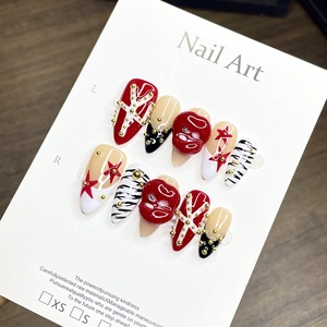 เล็บปลอมลายอัลมอนด์ขายดี หรูหราและหวานซ่อนเปรี้ยว ลายเล็บปลอมแบบกดติด สไตล์ใหม่ข้ามพรมแดน ลายเล็บปลอมสีแดงหวานซ่าและเท่ - Product Image 1