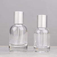 Venta al por mayor directa de fábrica: Botella de perfume redonda de vidrio transparente de 30ml, 50ml, 100ml con tapa y serigrafía para esmalte de uñas/aceite.
