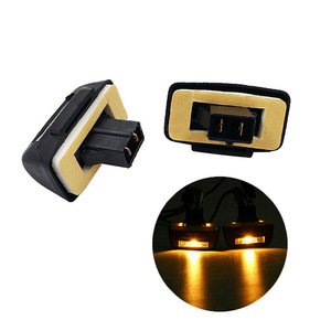 Luz de Matrícula Amarilla para Ford Transit 438111 86VB13550AC, Plástico, Distancia entre Orificios de 200 mm - Product Image 1