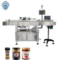 Etiquetadora Automática de Alta Velocidad para Botellas Redondas de Salsa de Soya, Jugo y Aceite Comestible - Aplicador de Etiquetas Envolventes SKILT