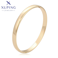 X000968605 XUPING Bracelet jonc minimaliste pour femme, en alliage de cuivre écologique plaqué or 14K, lisse et articulé, pour usage quotidien