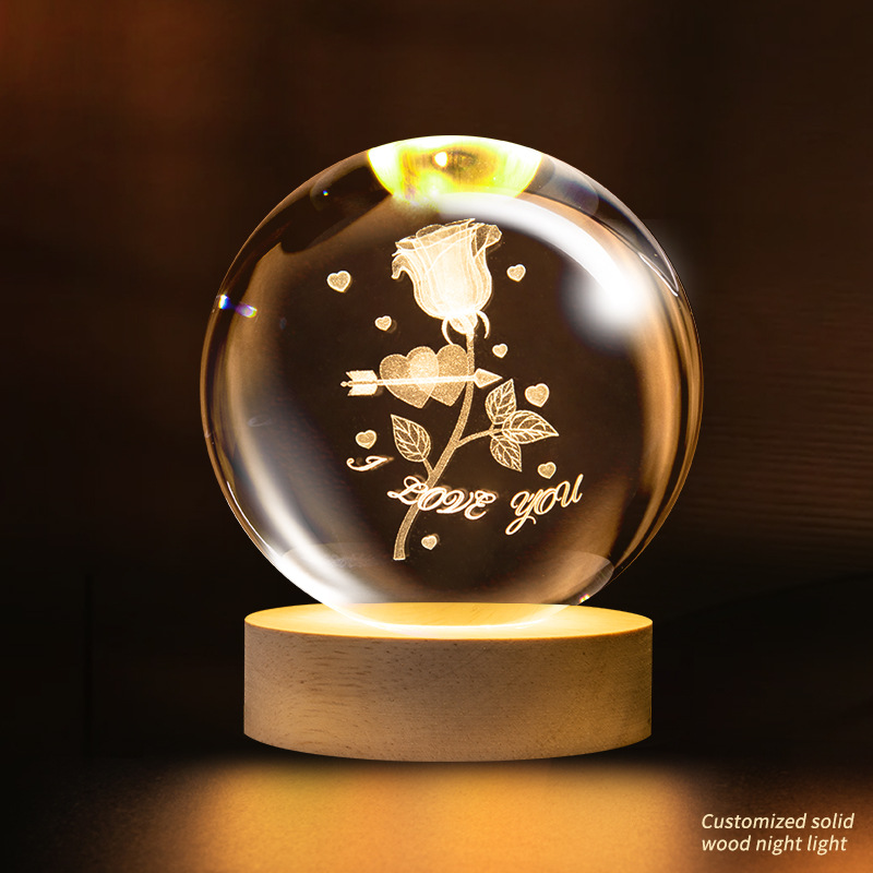 Crystal ball with a rose passing through it