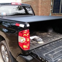 Couverture de benne pliante en trois parties en alliage d'aluminium noir pour Toyota Tundra Hilux Revo