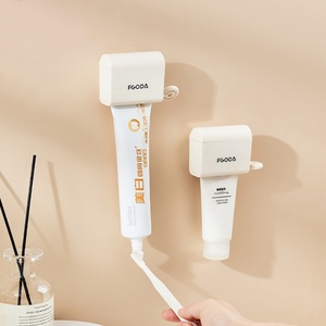 Dispensador automático de pasta de dientes multifuncional de plástico, soporte de pared para cepillos de dientes para el hogar - Product Image 6