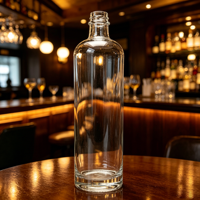 Bouteille de tequila ronde gravée en verre extra clair givré de 750 ml avec bouchon en caoutchouc, emballée en boîte, OEM ODM