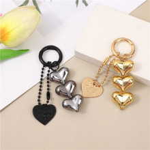 Nouvelle pêche pour l'amour chaîne en forme de coeur porte-clés pendentif mignon Couple métal étui de téléphone portable étudiant sac à dos et sac pendentif - Product Image 3