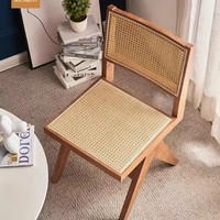 Chaise de salle à manger en bois massif de style japonais traditionnel avec dossier et accoudoirs décontractés, idéale pour restaurant Wabi-sabi