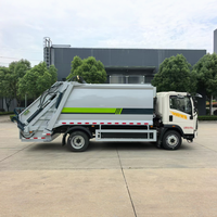 Camion compacteur de déchets Sinotruk HOWO 4x2, véhicule à énergie nouvelle, 10,5 m³, chargement arrière, pour la collecte des déchets