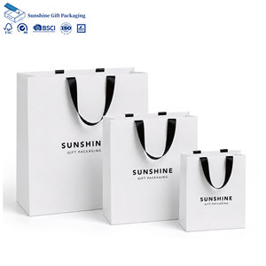 Custom Printed Logo Wholesale Luxury Retail Boutique Foldable White Paper Bags For Clothes Shoes Packaging Shopping Paper Bag - Product Image 1
