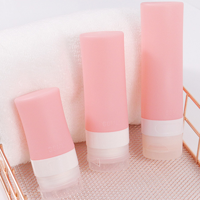 Bouteille rechargeable en silicone rose clair