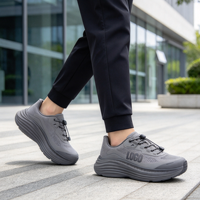 Chaussures de sport noires personnalisées avec logo OEM, design à boucle, respirantes, en maille souple, pour la marche et les loisirs
