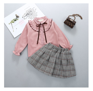 Produit chinois en gros, vêtements en coton tricoté, ensembles de chemisiers et jupes jaunes pour filles - Product Image 2