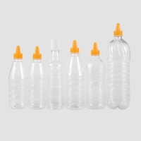 Bouteille de sauce ronde en plastique PET transparent de 16 oz avec capuchon en PP côtelé noir à col 38/400 avec doublure pour vinaigrettes ketchup marinades