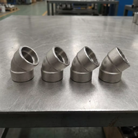 Coude à souder à douille en acier au carbone A105 forgé à 45 degrés, classe 3000, surface lisse pour applications de pipelines pétroliers et gaziers