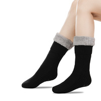 Chaussettes d'intérieur tricotées en fausse fourrure antidérapantes et thermiques pour l'hiver