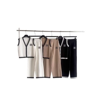 Completo due pezzi estivo 2026: Gilet senza maniche a tinta unita con contrasto in maglia e pantaloni a gamba larga, stile <span class=keywords><strong>moda</strong></span> transfrontaliero - Product Image 2
