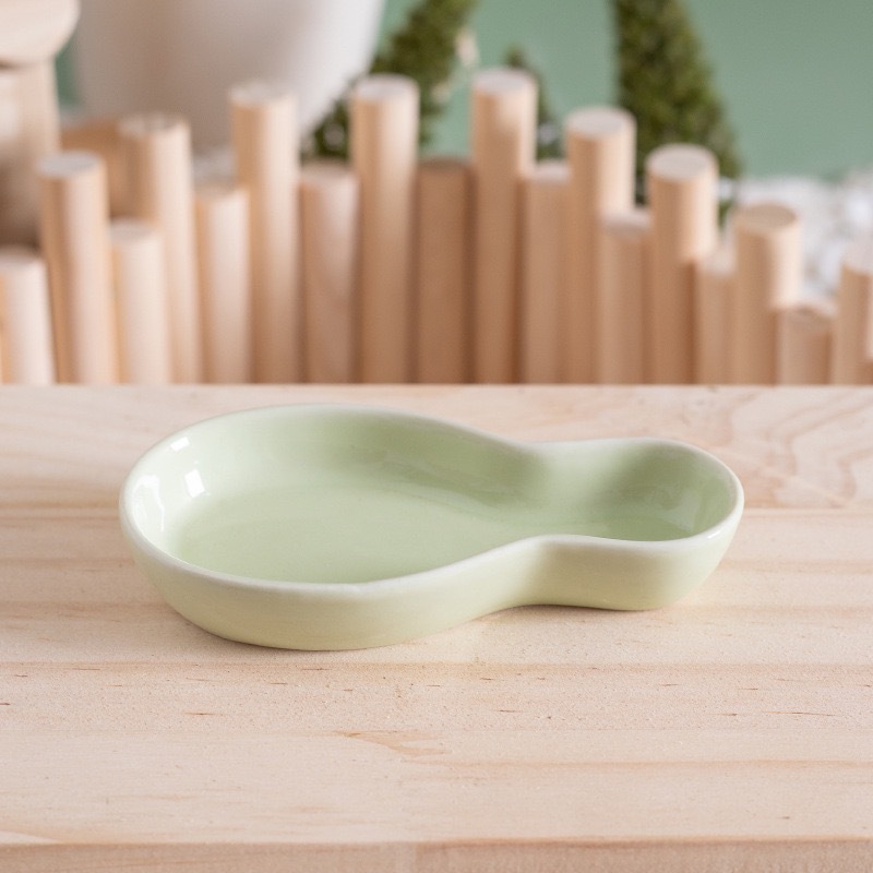 Plat de bowling pour petits animaux-vert
