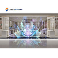 Écran LED transparent flexible P3.9 pour ascenseur, avec animation holographique couleur intégrale sur verre de fenêtre, et driver LED intégré à économie d'énergie