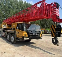 Équipement de logistique minière, maintenance d'installations et opérations sur site, incluant une grue sur camion Sany d'occasion de 25 tonnes, vente en gros