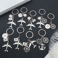 Porte-clés publicitaire en alliage de zinc, globe terrestre moderne en forme d'avion, cadeau publicitaire