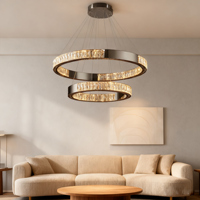 Lustre suspendu de luxe en acier inoxydable doré avec cristaux LED, hauteur réglable, idéal pour salon moderne et décoration intérieure