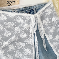 Nouvelle jupe mi-longue en dentelle blanche avec ceinture assortie, jupe courte superposée douce et polyvalente, robe enveloppante