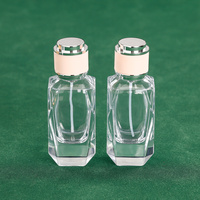Flacon de parfum en verre transparent multi-facettes de 50 ml avec bouchon rose et argenté - Design de luxe à facettes de diamant pour emballage de parfum unisexe