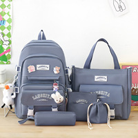 Sac à dos scolaire tendance en toile de grande capacité, nouveau style, léger, ensemble multi-pièces, coussin d'air, unisexe, sac à livres pour étudiants